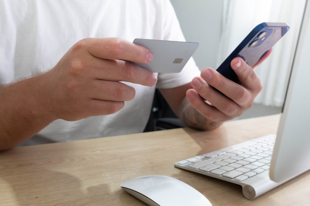 Man making online payment with smartphone